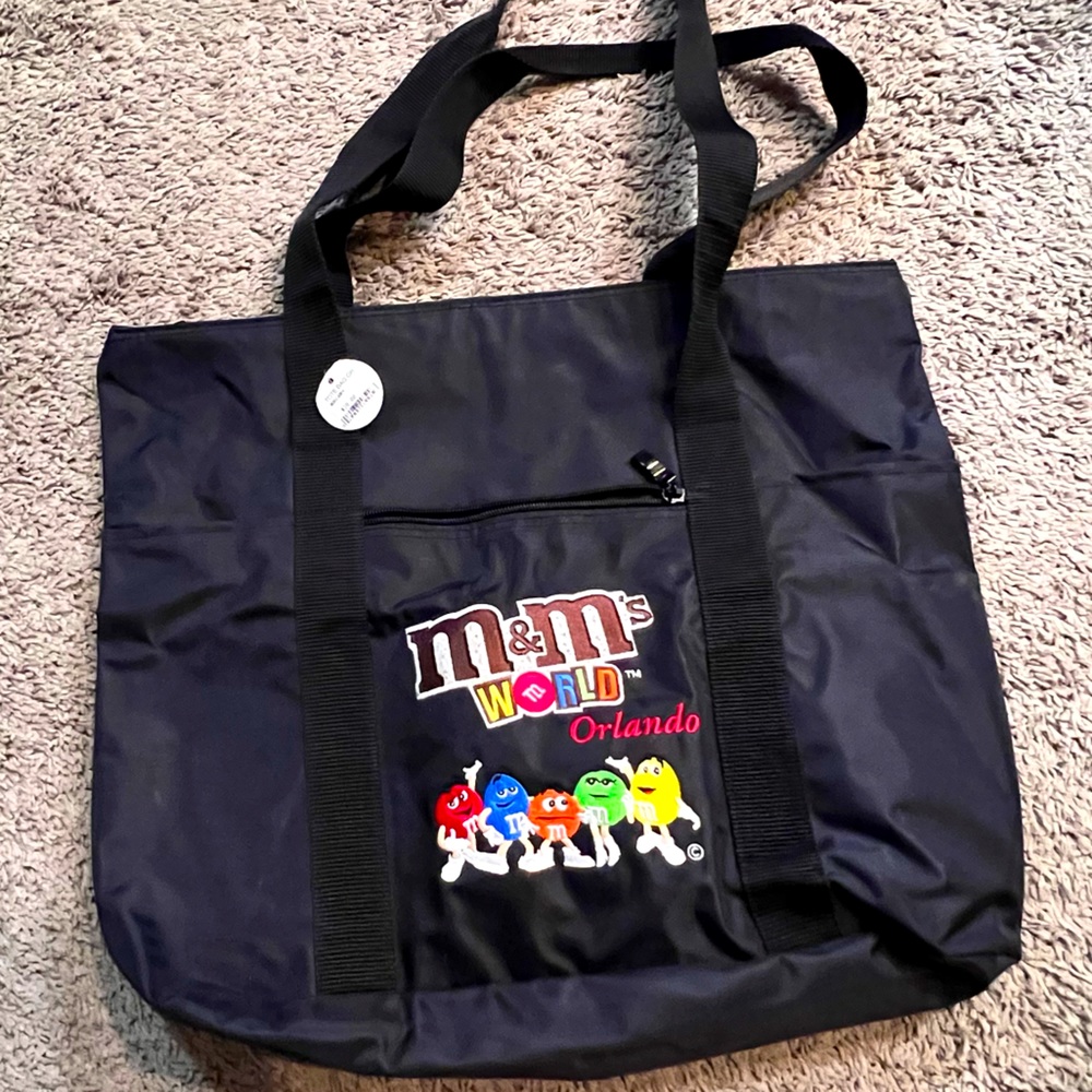 M&M big tote. Baby bag or Travel bag NWT All purpose bag.